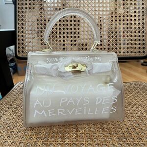 Transparent Handbag with Gold Accents